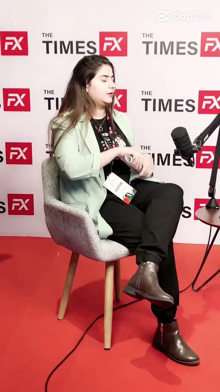 Hira Majeed seated for a recorded interview at The Times FX media booth